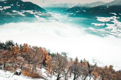 Scenic view of snow covered landscape against sky