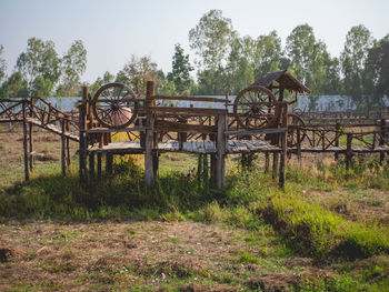 Abandoned truck on field against sky