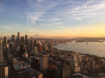 Aerial view of city at sunset