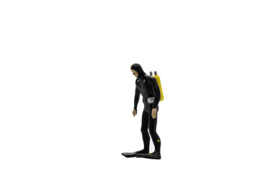 Side view of a woman walking on white background