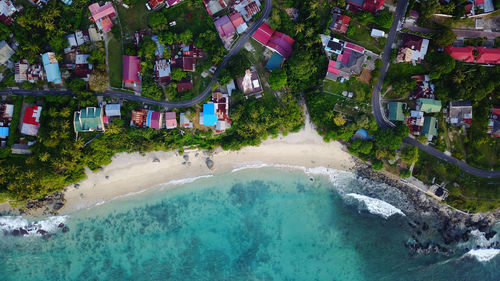 High angle view of swimming pool by houses