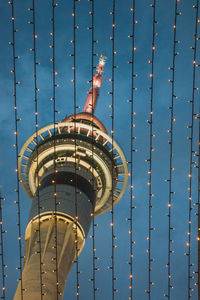 Close-up of built structure against blue sky