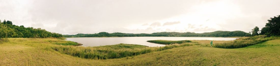 Panoramic view of river against sky