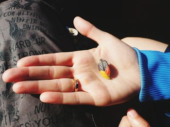 Close-up of woman holding hands