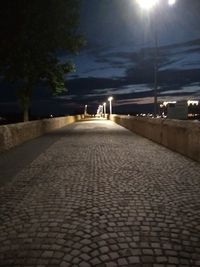 Illuminated street at night