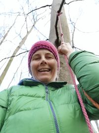 Portrait of a smiling woman in snow