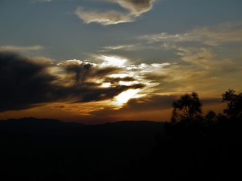 Scenic view of dramatic sky during sunset