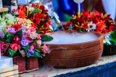 Close-up of flowers in vase on table