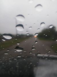 Full frame shot of raindrops on glass window
