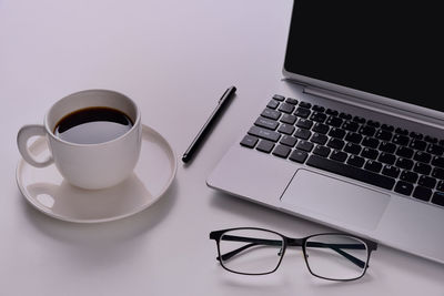 Coffee cup on table