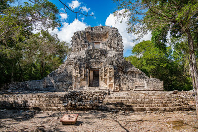 Low angle view of old ruins against sky