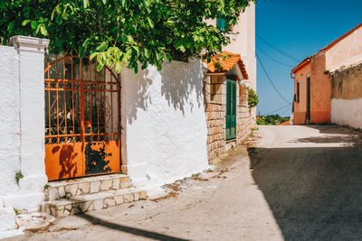 Buildings by street in city