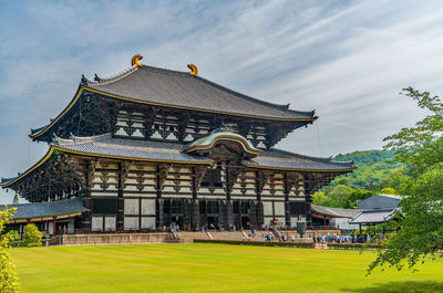 View of temple against building