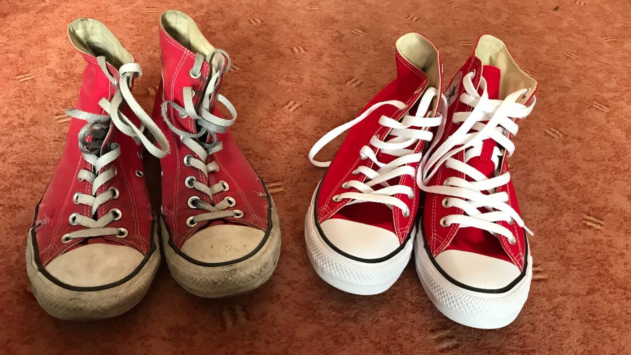 shoe, pair, still life, indoors, no people, red, close-up, canvas shoe, choice, variation, shoelace, high angle view, group of objects, fashion, compatibility, colored background, side by side, table, white color, directly above, personal accessory