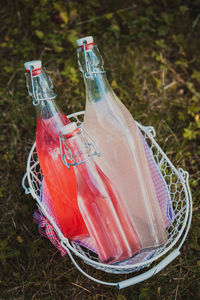 High angle view of red wine in glass bottle