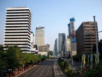 Buildings in city against sky