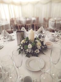 Close-up of glasses on table at restaurant