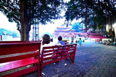 People sitting on bench