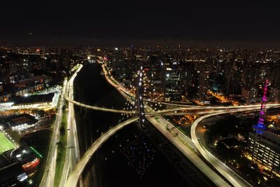 High angle view of illuminated cityscape at night