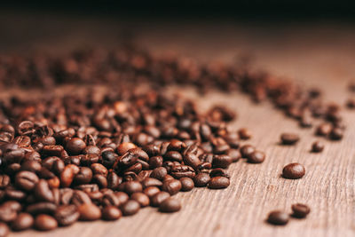 Close-up of coffee beans on table