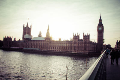 View of clock tower bridge over river