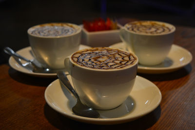 Close-up of coffee cup on table