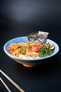 Close-up of food in plate on table