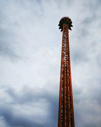 Low angle view of rollercoaster against sky