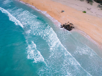 High angle view of sea waves on shore