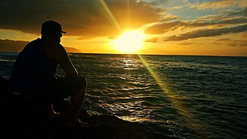 Scenic view of sunset over sea