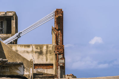 Low angle view of old building against sky