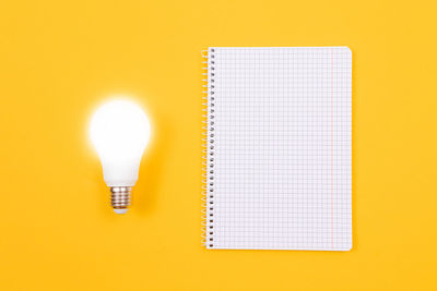 Close-up of illuminated light bulb