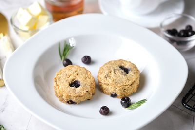 High angle view of cookies in plate on table