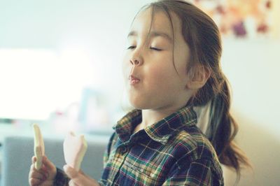 Close-up portrait of cute girl