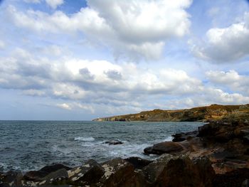 Scenic view of sea and cloudy sky