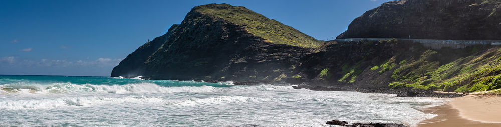 Panoramic view of sea against clear sky