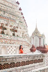 Beautiful symetry of the tample with a lady