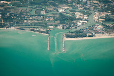 High angle view of city by sea