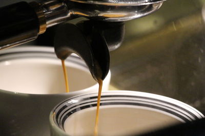 Close-up of coffee beans in glass