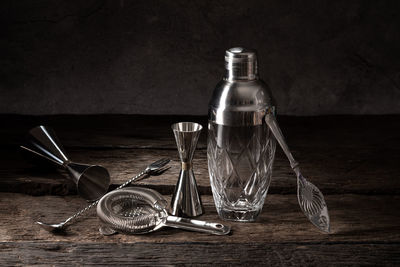 Close-up of glass bottle on table