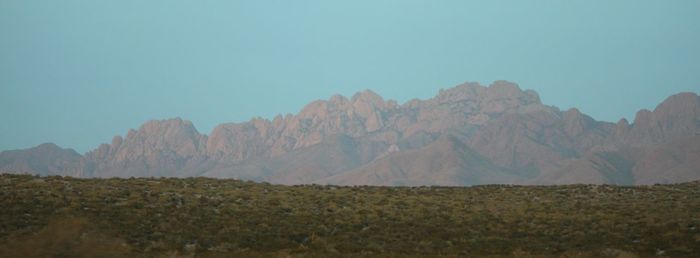 Scenic view of mountains against clear sky