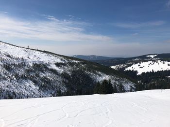 Snow covered mountain against sky