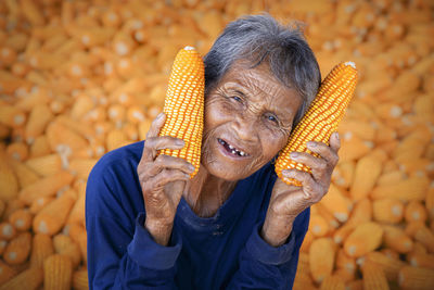 Close-up portrait of a woman holding ice cream