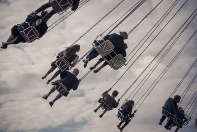 Low angle view of ferris wheel against sky