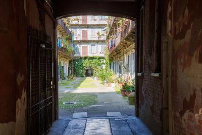 Empty alley amidst old building