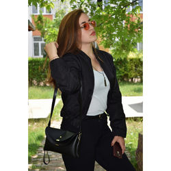 Young woman standing on grass