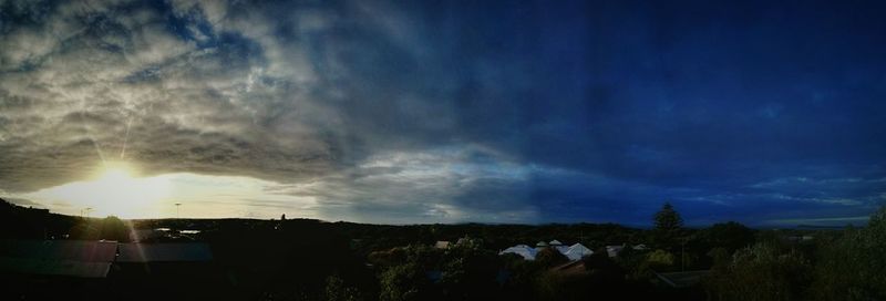 Scenic view of landscape against cloudy sky