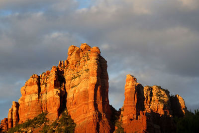 Low angle view of rocky cliff