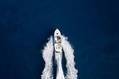 Aerial view of motorboat in sea