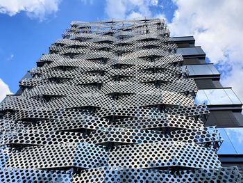 Low angle view of modern building against sky